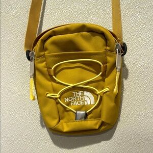The North Face gold Crossbody Bag